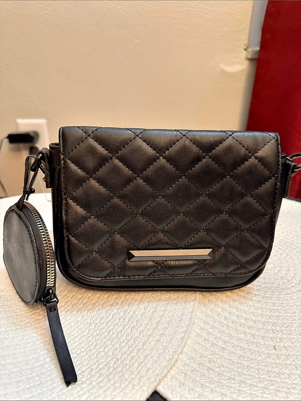 Loume Quilted Crossbody Bag in Black